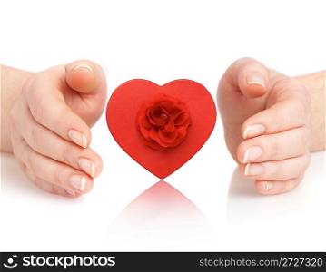 Human hands and heart on a white background