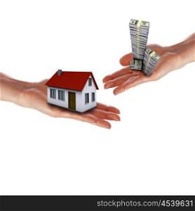 human hands holding model of a house against nature background