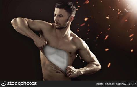 Human mannequin pulling his chest skin away