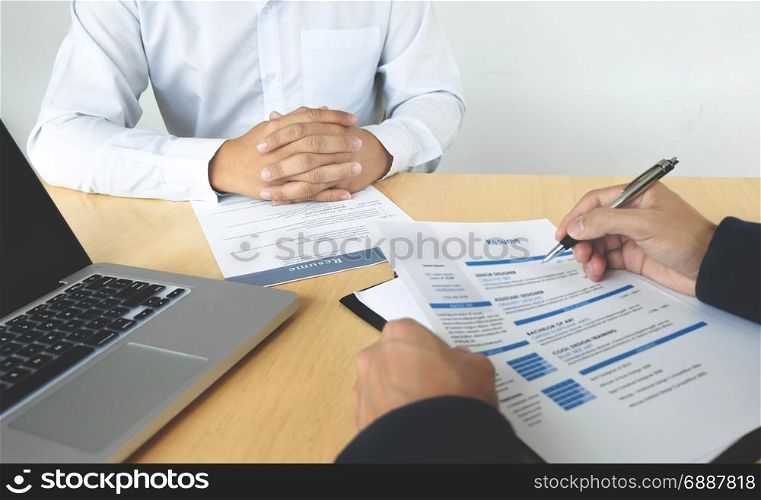 Human resource commission interviewing candidate at workplace