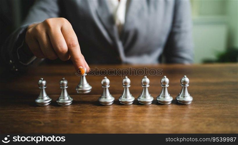 Human resources concept career management with clasped hands planning strategy with chess figures. HR department Search for employees by  inequality in work collective
