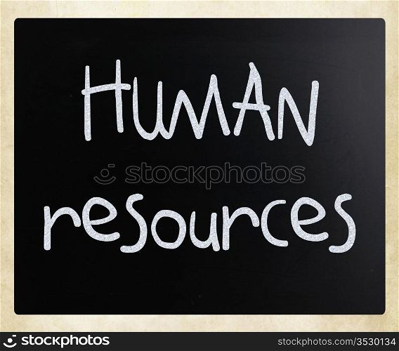""Human resources" handwritten with white chalk on a blackboard."