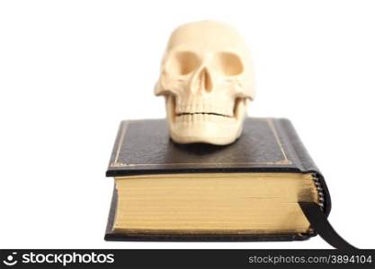 Human Scull On Book isolated on white