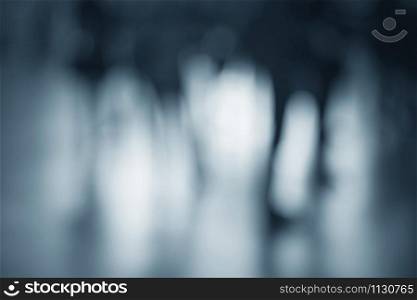 Human silhouettes in blur.
