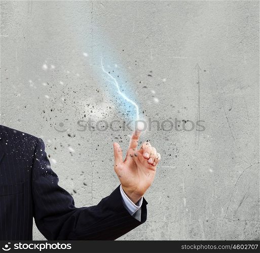 Human strength and power. Close up of human hand with flash of lightning