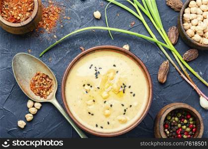 Hummus, a cold appetizer of chickpeas puree. Popular Eastern food.. Bowl of hummus