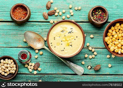 Hummus,chickpeas puree,popular Eastern food.Hummus of chickpea,with spices. Delicious chickpeas hummus