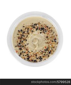 Hummus in a Plastic Container Isolated on White Background