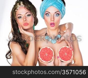 Humorous Fancy Women holding Grapefruit - Performance