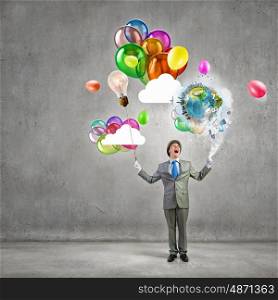 Humorous guy with balloons. Funny man in suit with bunch of colorful balloons in hand. Elements of this image are furnished by NASA