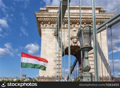 Hungarian flag at chain bridge Budapest, capital city of Hungary. Hungarian flag at chain bridge Budapest, Hungary