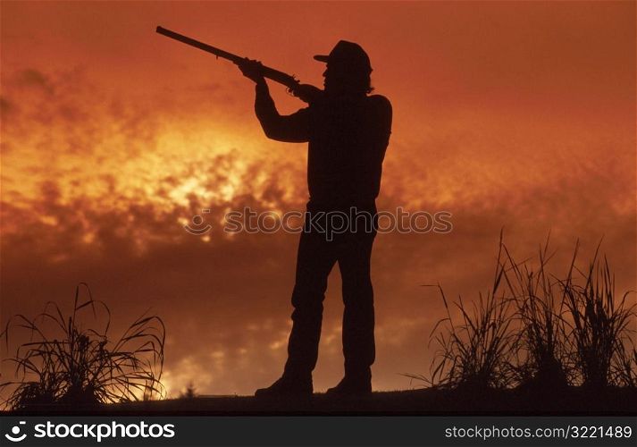 Hunter Shooting his Gun
