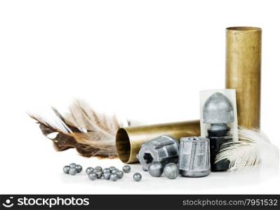 Hunting cartridges, bullets and lead shot, isolated on white background