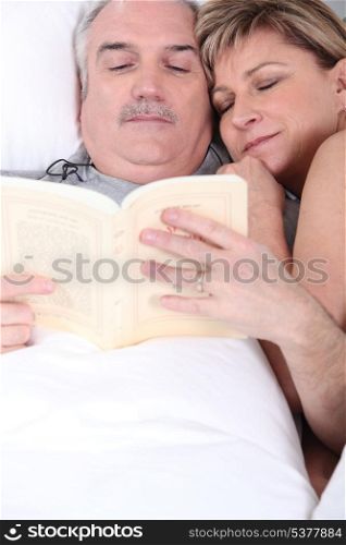 Husband and wife cuddling