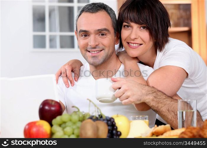 husband and wife having breakfast