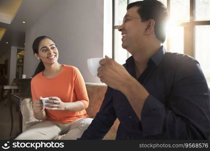 husband and wife having tea together