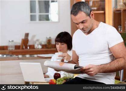 husband and wife in the kitchen