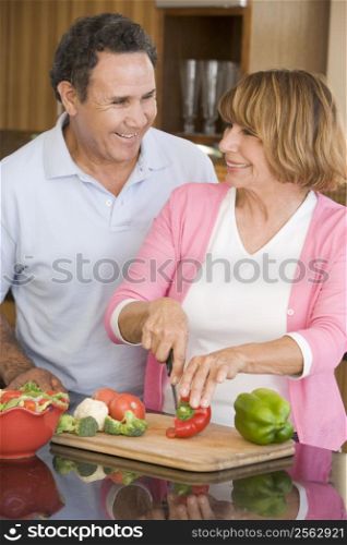 Husband And Wife Preparing meal,mealtime Together