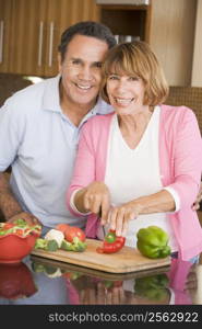 Husband And Wife Preparing meal,mealtime Together