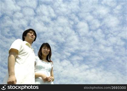 Husband and wife under the blue sky