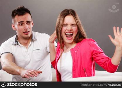 Husband apologizing wife. Upset, angry, mad woman refuses apology. Boyfriend trying to convince heartbroken girlfriend. Man asking for forgivness. Conflicted couple. Relationship problem.