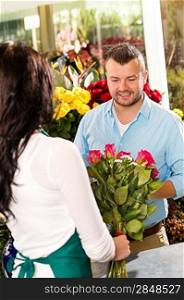 Husband buying roses bouquet romantic flower market florist