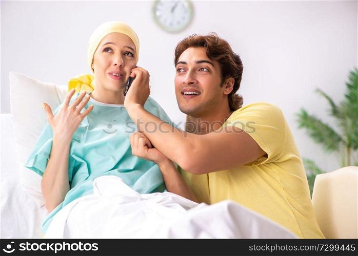 Husband looking after wife in hospital 