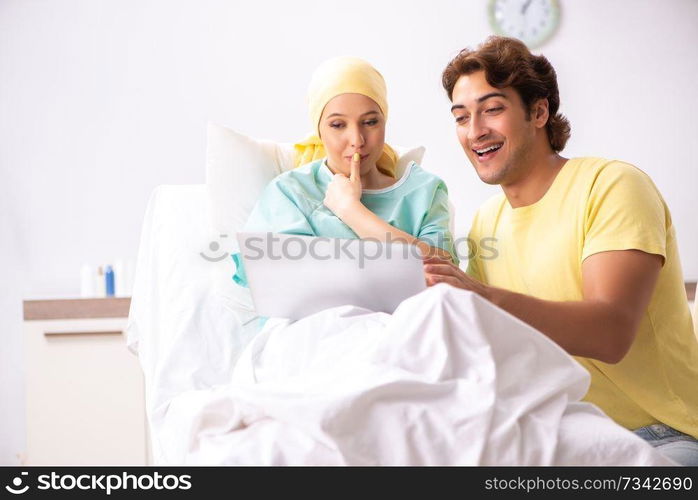 Husband looking after wife in hospital 