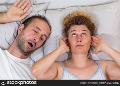 Husband snoring sleep and leaves his wife