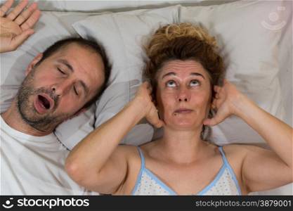 Husband snoring sleep and leaves his wife
