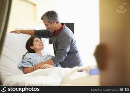 Husband Visiting Wife In Hospital