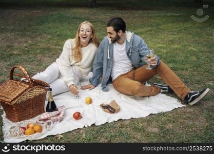 husband wife having picnic together outside 2