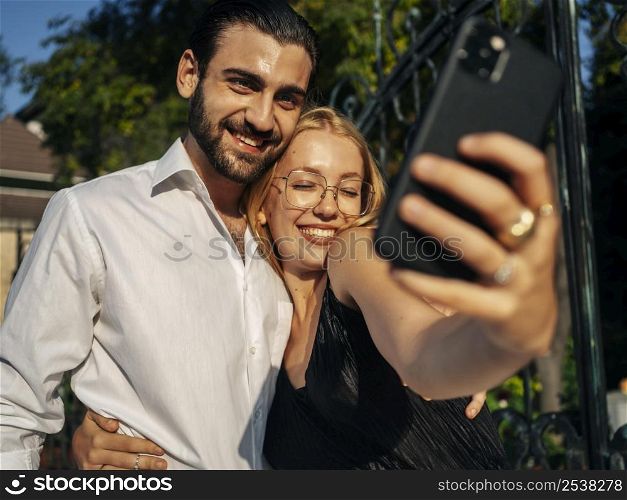 husband wife taking selfie