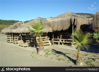 Huts with straw roof on Iztuzu beach, Dalyan