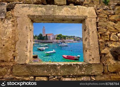 Hvar island church and stone beach window view, Dalmatia, Croatia
