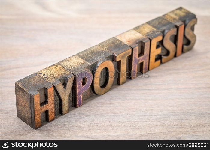 hypothesis word abstract - text in vintage wooden letterpress printing blocks against grained wood