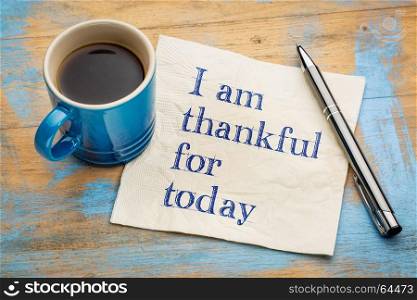 I am thankful for today - handwriting on a napkin with a cup of espresso coffee