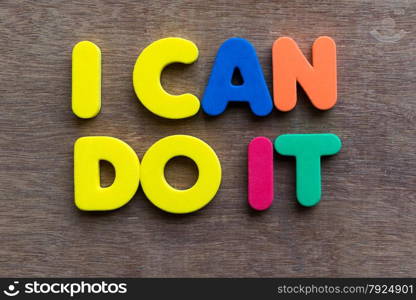 i can do it words in wood background