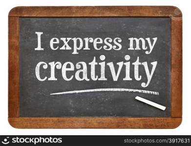 I express my creativity positive affirmation on a vintage slate blackboard