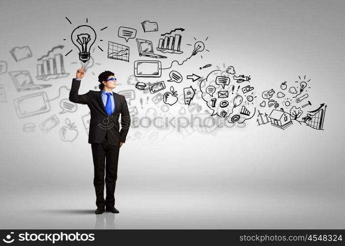 I have idea. Image of young businessman wearing goggles. Idea concept