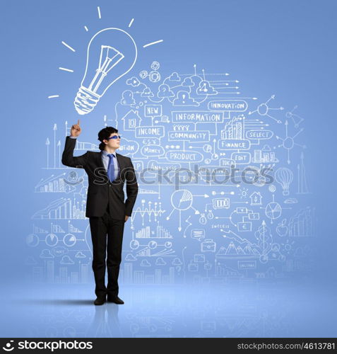 I have idea. Image of young businessman wearing goggles. Idea concept