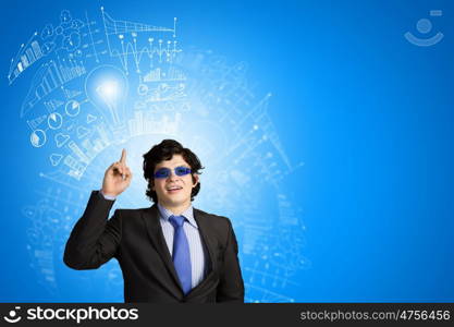 I have idea. Image of young businessman wearing goggles. Idea concept