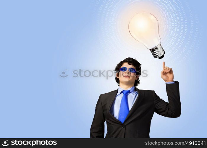 I have idea. Image of young businessman with light bulb. New idea and inspiration