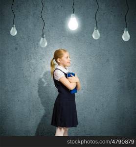 I have idea. Little cute girl and electric bulbs hanging above