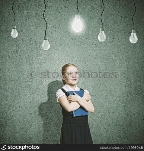 I have idea. Little cute girl and electric bulbs hanging above