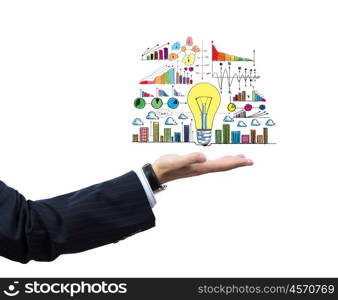 I have interesting idea. Businessman hand holding light bulb in palm