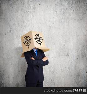 I have question. Businessman with box on head expressing emotions