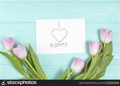 i love mommy inscription with tulips