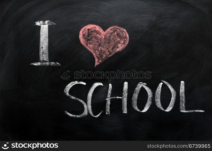I love school - text written with chalk on a blackboard