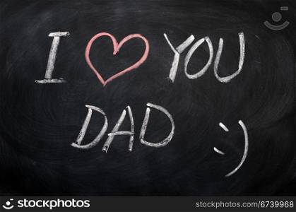 I love you Dad - text written with chalk on a blackboard